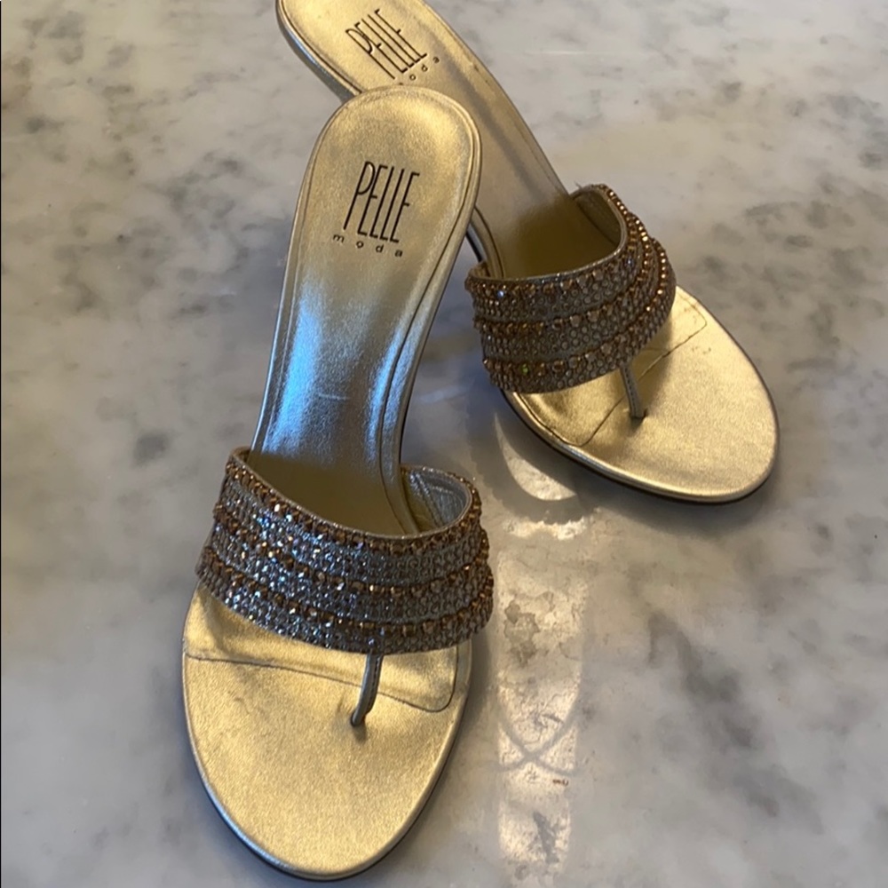 Ladies heeled sandal.  jewlels across foot